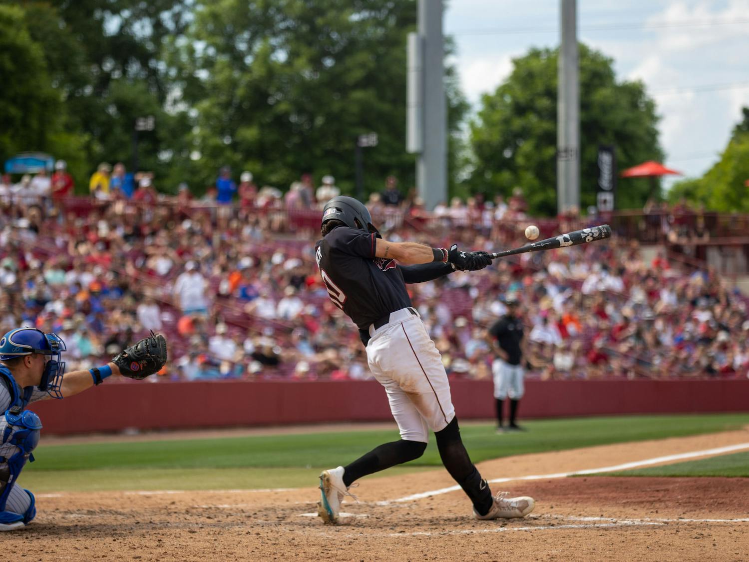 Senior outfielder Dylan Brewer connects with the ball on April 22, 2023, at Founders Park during the third game between South Carolina and Florida. Brewer accounted for three runs and went 4-5 at the plate in the series finale.