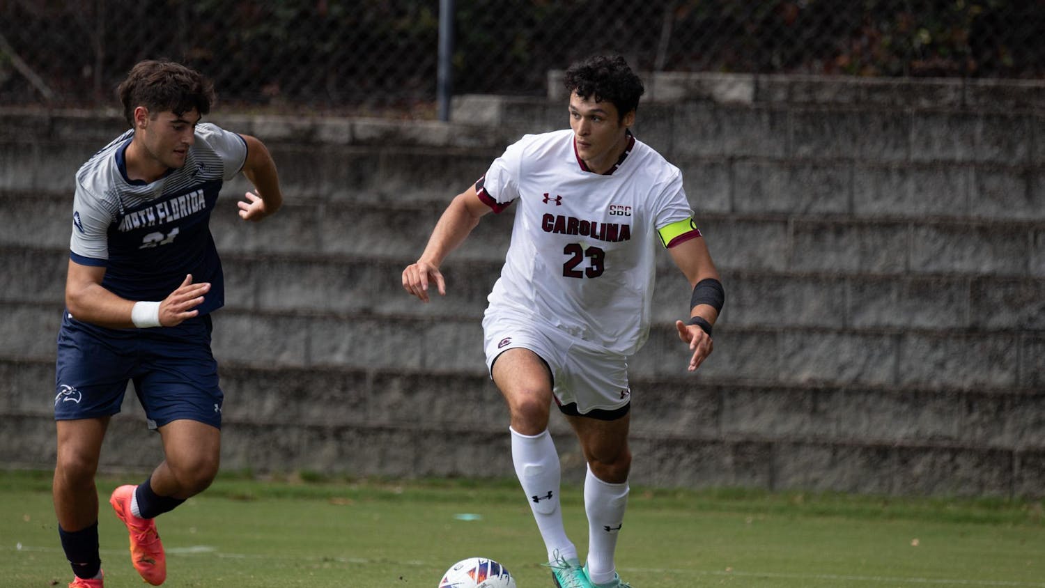 FILE — Senior forward Harrison Myring prepares to cross the ball to his teammates in the match against the University of North Florida on Aug. 17, 2024. Myring scored two goals in the Gamecocks' game against USC Upstate on Tuesday.