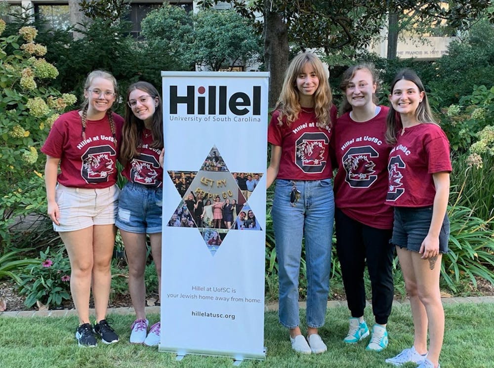 <p>Hillel board members at their annual Family Weekend pop-in event at the Anne Frank Center on Sept. 23, 2022. Hillel hosts a multitude of events throughout the semester to bring the Jewish community together.</p>