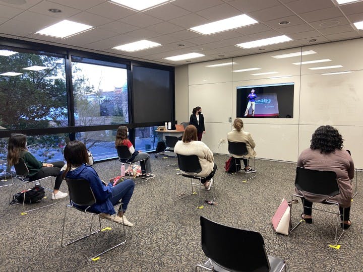 Parker Massignan, third-year international business and economics student and vice president of Women LEAD, speaks during a meeting.