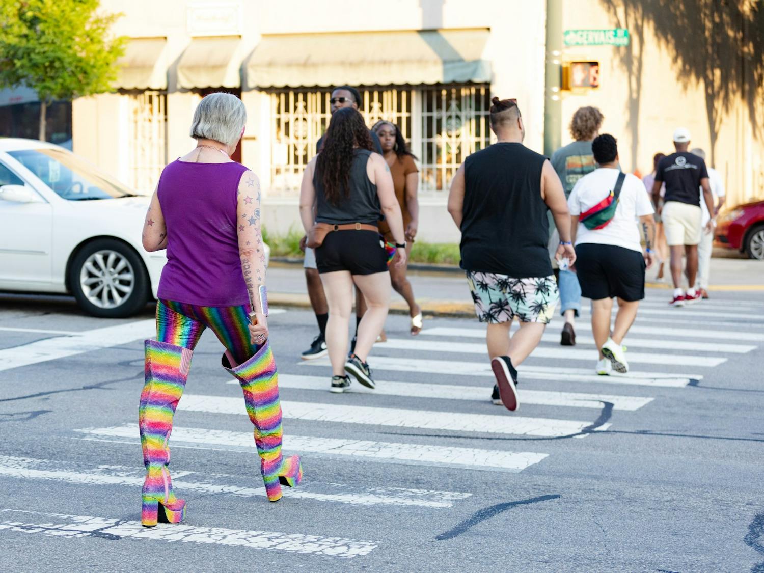 An Outfest attendee leaves the venue on Park Street on June 4, 2022. Outfest featured performances, food and vendors in honor of Pride month.