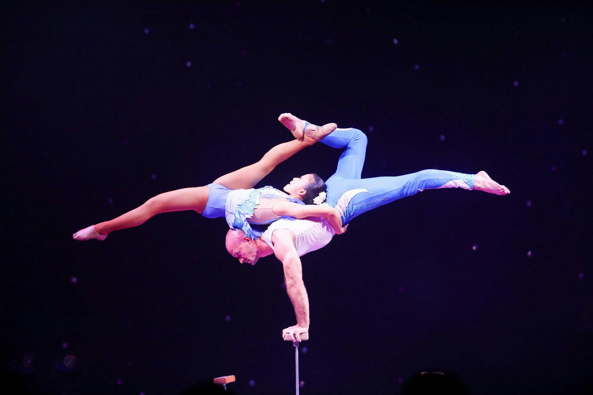 Hand balancing artist Ian Faraonel and his assistant perform an acrobatic balancing act during the circus at the South Carolina State Fair on Oct. 11, 2025. Faraonel has also appeared in the Super American Circus and the Jaffa Shrine Circus.