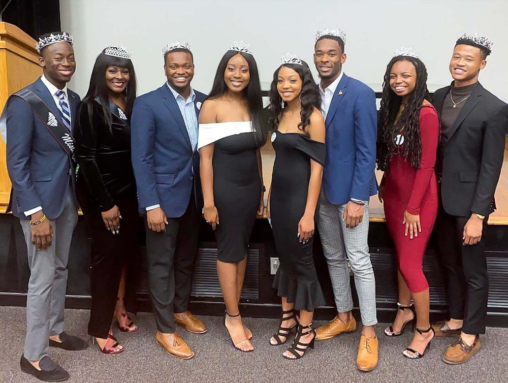 <p>The 2019-2020 Mister and Miss Black USC winners showing off their crowns. This year's pageant will be the first one held on Oct. 26.</p>