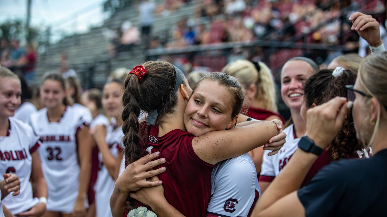 Fifth-year goalkeeper Heather Hinz hugs senior midfielder Rylee Forster before their game on Sept. 10, 2023. The team celebrated senior night with a 2-0 victory over Furman.
