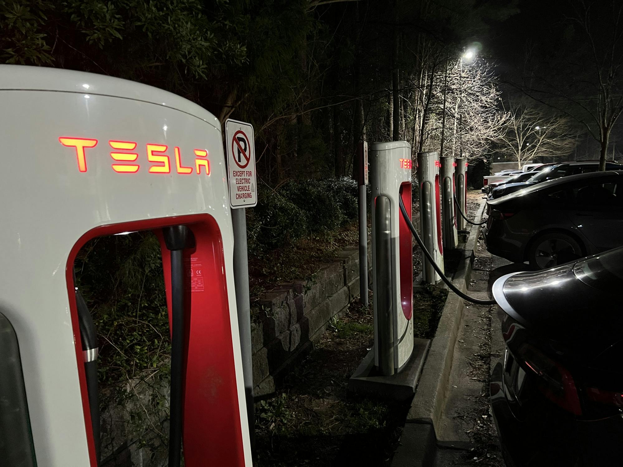 Tesla owner Laura Streit using one of the few available Tesla supercharging stations in Columbia, South Carolina, on Feb. 8, 2023. The charging station can take a Tesla Model 3 to full charge in eight and a half to 10 hours at a 220 voltage, giving it a range of 315 miles.&nbsp;