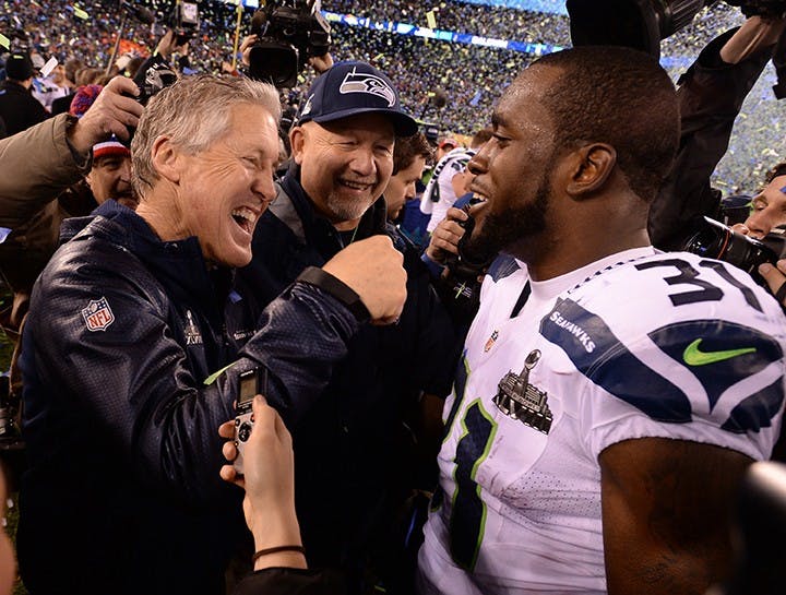 Head coach Pete Carroll of the Seahawks celebrates with Kam Chancellor (31) after Seattle wins Super Bowl XLVIII at MetLife Stadium in East Rutherford, N.J., on Sunday, Feb. 2, 2014. The Seattle Seahawks defeated the Denver Broncos, 43-8. (Lionel Hahn/Abaca Press/MCT)