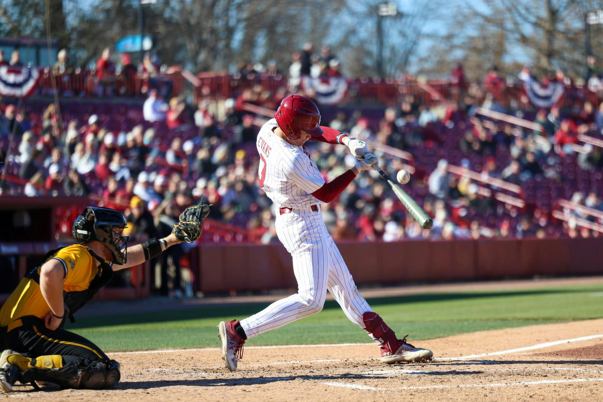 Junior infielder Patrick Evans hits the ball during the game against Northern Kentucky on Feb. 13, 2026. Evans scored two runs and hit one home run.
