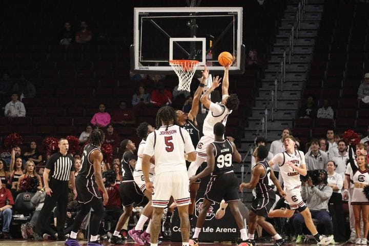 Junior forward Elijah Strong finishes a contested layup against Mississippi State on Feb. 21, 2026, at Colonial Life Arena. Strong finished with 16 points to help the Gamecocks with the win.