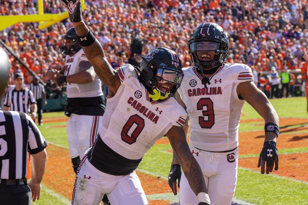 <p>File—Junior tight end Jaheim Bell and junior wide receiver Antwane Wells Jr. celebrating after a touchdown on Nov. 26, 2022. The Gamecocks won over Clemson 31-30.</p>