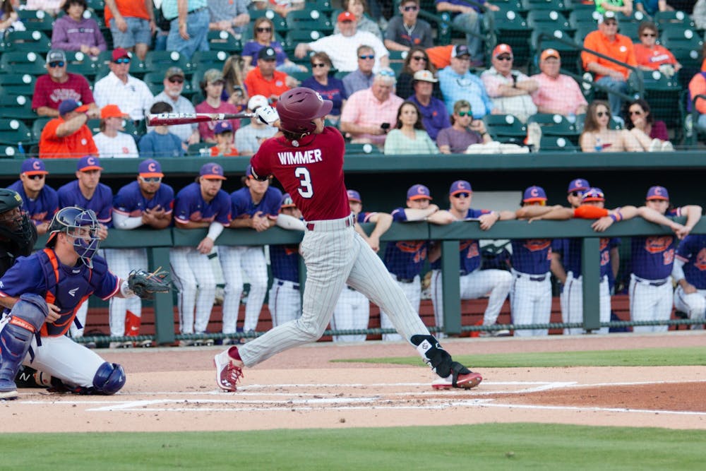 <p>FILE—Senior infielder Braylen Wimmer bats in the first inning during a game on March 5, 2022. The Gamecocks fell 2-10 in the second game of the series against Clemson.&nbsp;</p>
