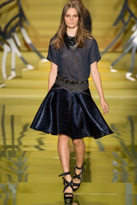 	The casual studded slung belt paired with an almost see-through shirt at Versace complimented the full skirt perfectly.