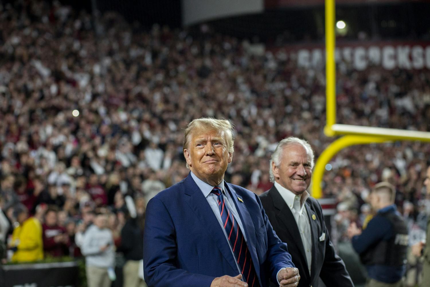FILE — 45th President Donald Trump joins South Carolina Governor Henry McMaster at Williams-Brice Stadium on Nov. 25, 2023. The appearance drew a mixture of praises as well as some boos from the crowd.