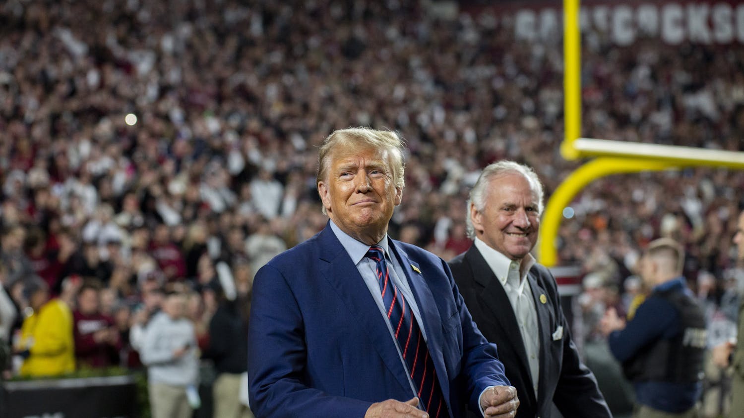 FILE — 45th President Donald Trump joins South Carolina Governor Henry McMaster at Williams-Brice Stadium on Nov. 25, 2023. The appearance drew a mixture of praises as well as some boos from the crowd.