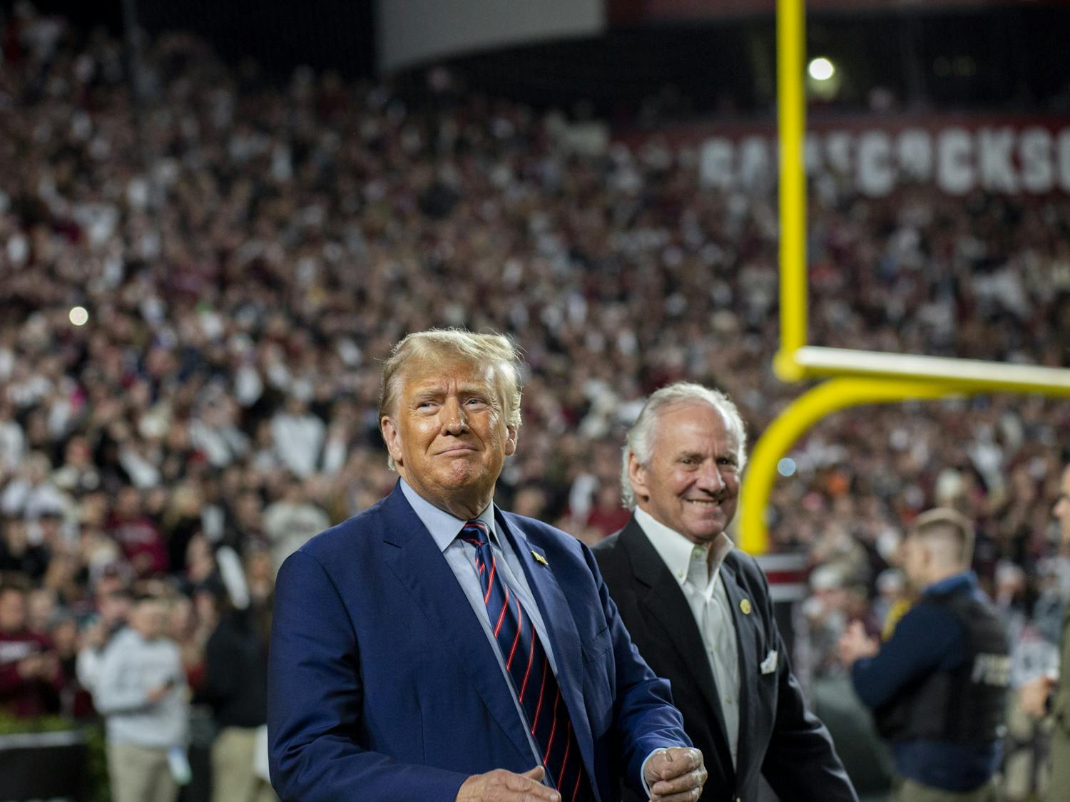FILE — 45th President Donald Trump joins South Carolina Governor Henry McMaster at Williams-Brice Stadium on Nov. 25, 2023. The appearance drew a mixture of praises as well as some boos from the crowd.