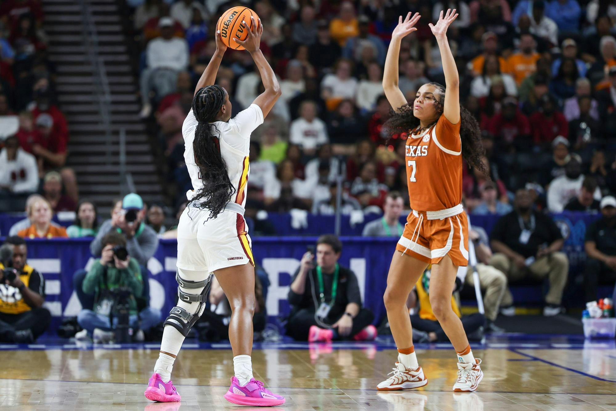 Senior guard Ta’Niya Latson is heavily guarded by Texas sophomore guard Jordan Lee at the 3-point line, looking for an open teammate again Texas on March 8, 2026, at Bon Secours Wellness Arena. The Gamecocks fell short at the Women’s SEC Tournament championship 78-61.