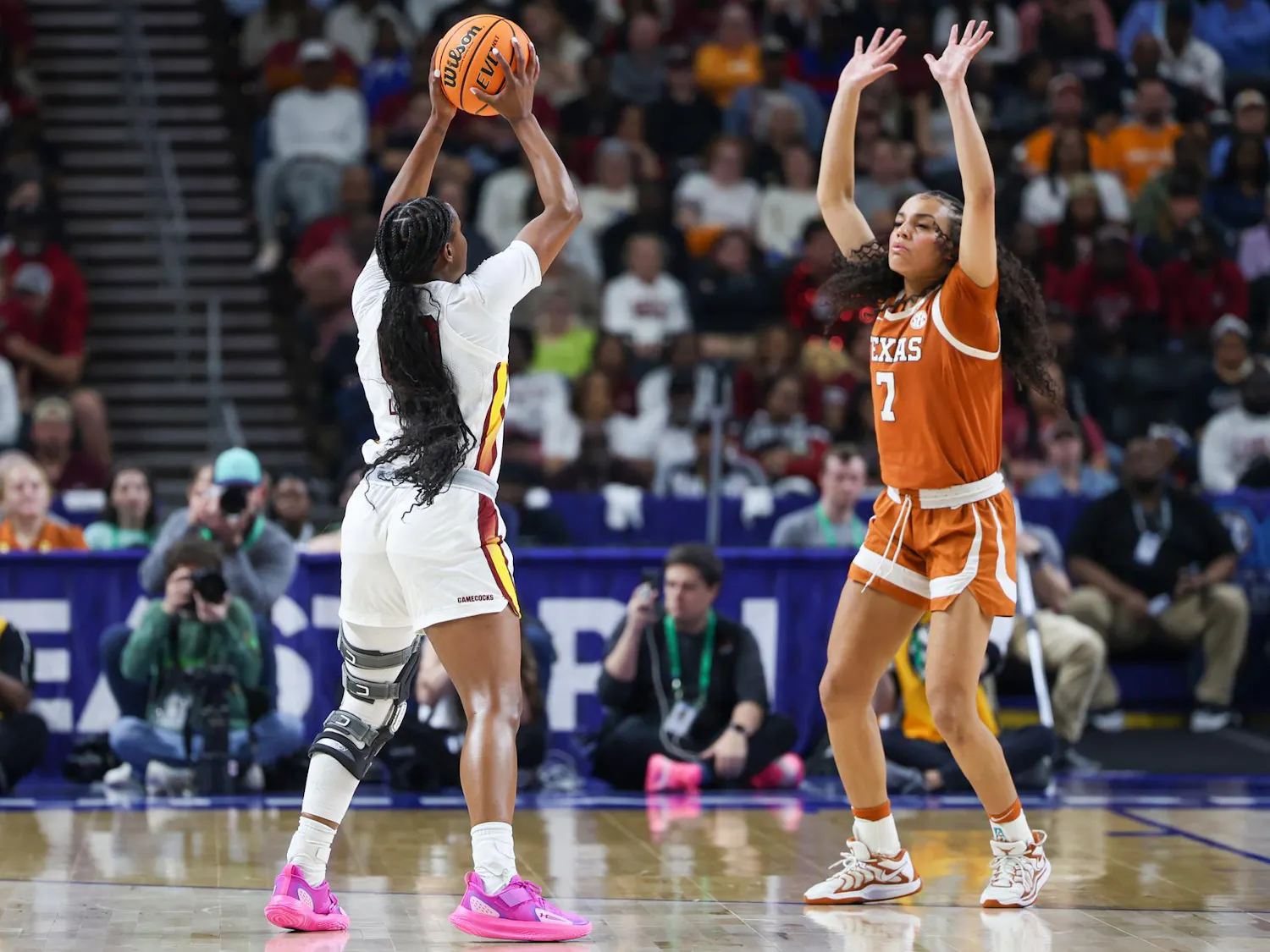 Senior guard Ta’Niya Latson is heavily guarded by Texas sophomore guard Jordan Lee at the 3-point line, looking for an open teammate again Texas on March 8, 2026, at Bon Secours Wellness Arena. The Gamecocks fell short at the Women’s SEC Tournament championship 78-61.