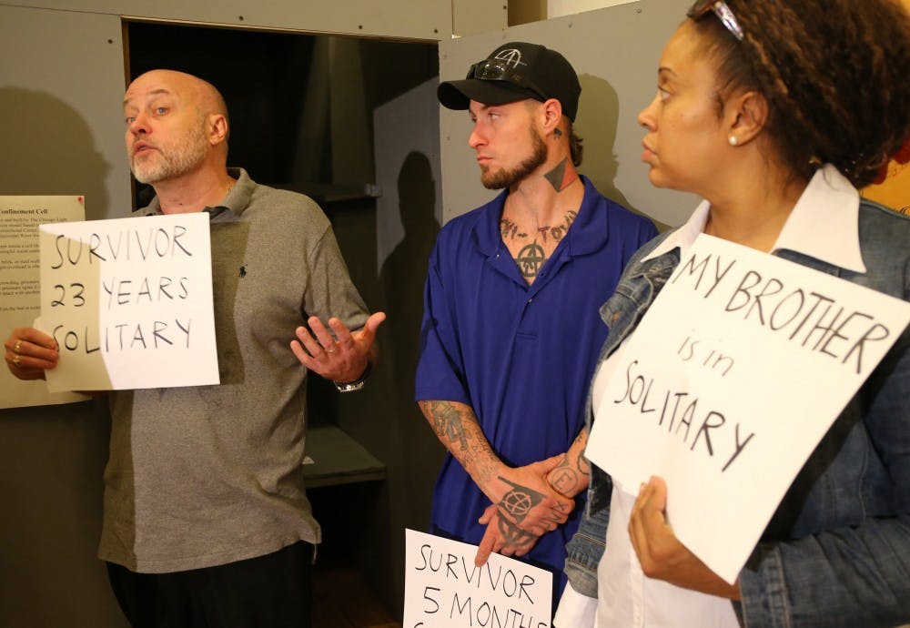 Brian Nelson, left, who spent 23 years in solitary confinement, speaks about his time in solitary confinement on June 24, 2015, during a press conference regarding the class action lawsuit filed on behalf of prisoners against the Illinois Department of Corrections for its overuse and misuse of solitary confinement in Illinois prisons in Chicago. Center is Mark Neiweem, who spent 5 months in solitary confinement, and Latonia Walker who has a brother in solitary confinement. (Antonio Perez/Chicago Tribune/TNS)