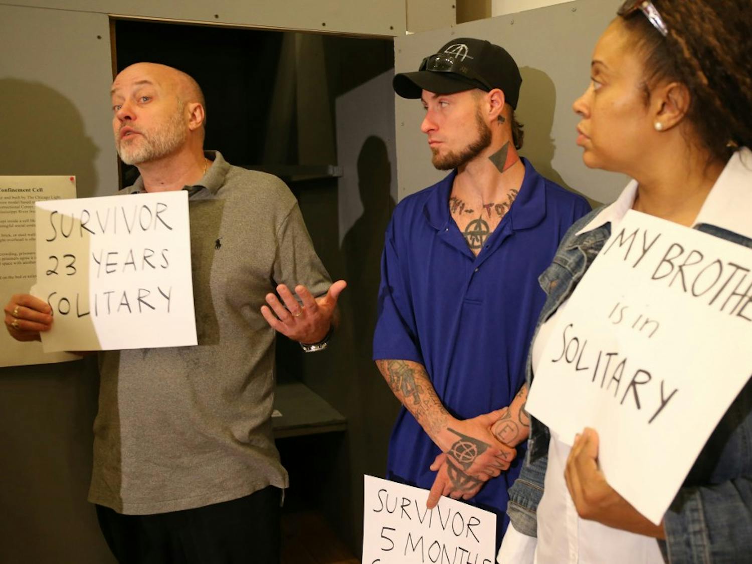 Brian Nelson, left, who spent 23 years in solitary confinement, speaks about his time in solitary confinement on June 24, 2015, during a press conference regarding the class action lawsuit filed on behalf of prisoners against the Illinois Department of Corrections for its overuse and misuse of solitary confinement in Illinois prisons in Chicago. Center is Mark Neiweem, who spent 5 months in solitary confinement, and Latonia Walker who has a brother in solitary confinement. (Antonio Perez/Chicago Tribune/TNS)