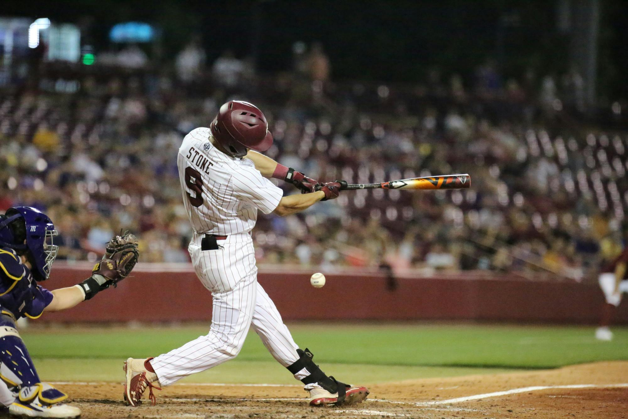 Sophomore outfielder Evan Stone swings at a pitch in hopes of getting on base for the Gamecocks and improving the lead against the LSU Tigers. No. 6 South Carolina won the first game of a two-game series 13-5 against No. 1 LSU on April 6, 2023.