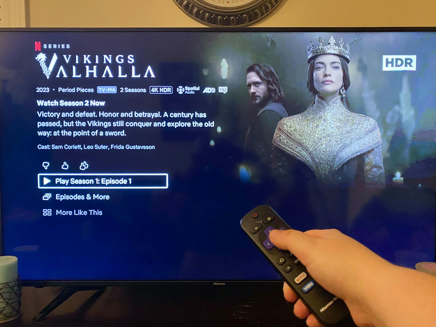 A photo illustration of a person watching "Vikings: Valhalla" on a television screen. The series is a spin-off of the popular History Channel show "Vikings," and its second 鶹С򽴫ý aired on Netflix on Jan. 12, 2023.