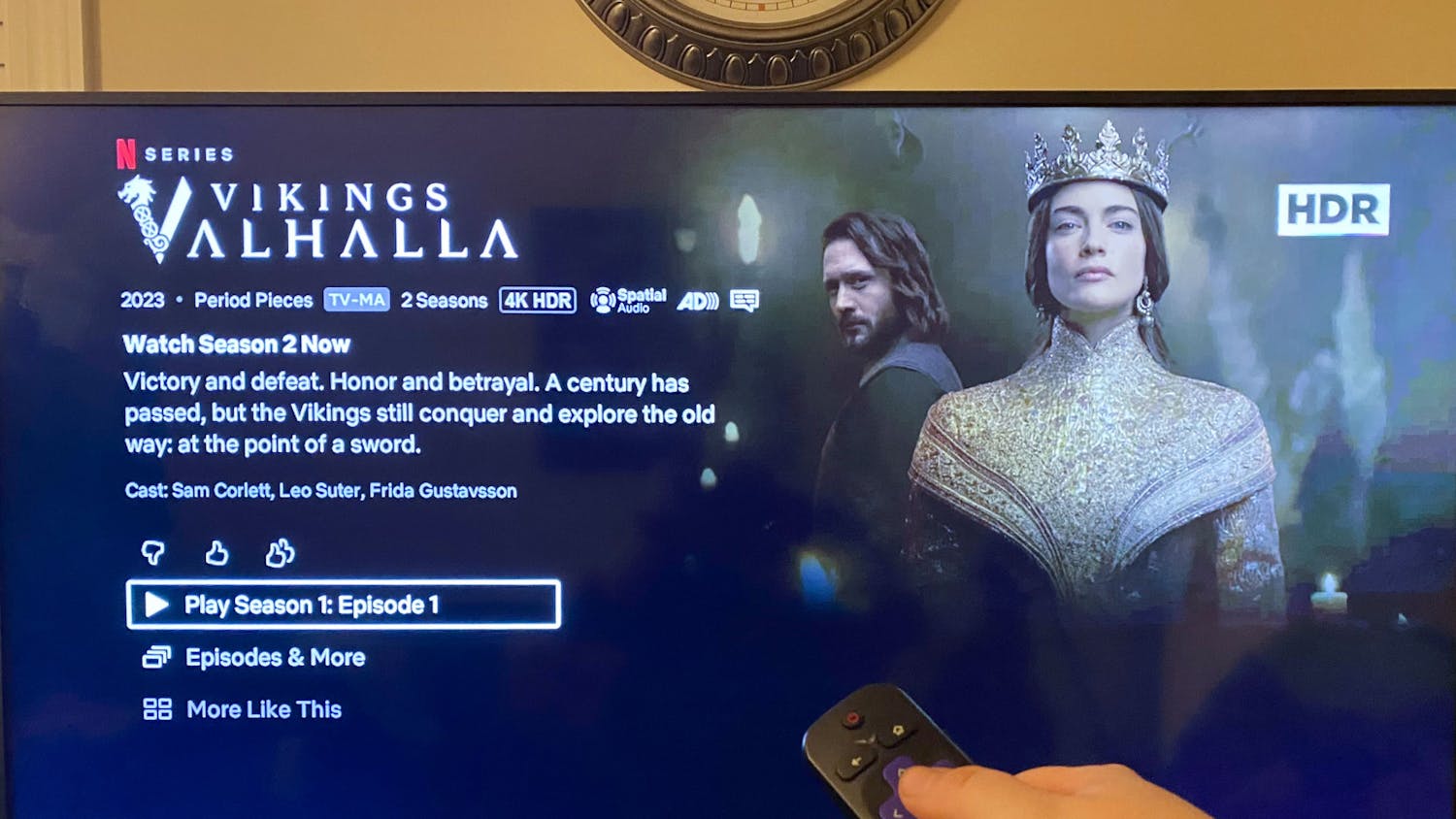 A photo illustration of a person watching "Vikings: Valhalla" on a television screen. The series is a spin-off of the popular History Channel show "Vikings," and its second season aired on Netflix on Jan. 12, 2023.