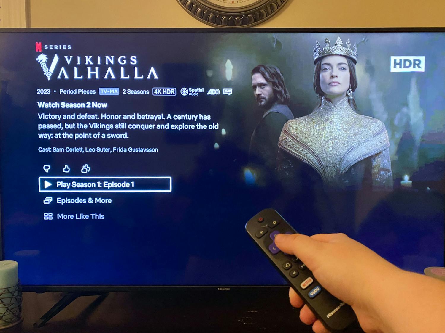 A photo illustration of a person watching "Vikings: Valhalla" on a television screen. The series is a spin-off of the popular History Channel show "Vikings," and its second season aired on Netflix on Jan. 12, 2023.