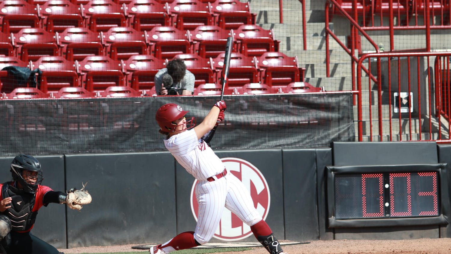 Senior infielder Ella Chancey makes contact with the pitch at Carolina Softball Stadium on Feb. 23, 2025. Ella Chancey had two at-bats and four runs batted in during the game against the University of Nevada- Las Vegas with a 9-4 victory and continue its winning streak, 16-0.