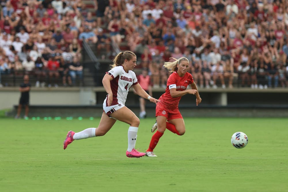 <p>FILE — Sophomore forward Katie Shea Collins chases the ball downfield during the game against Ohio State at Eugene E. Stone III Stadium on Aug. 21, 2025.</p>