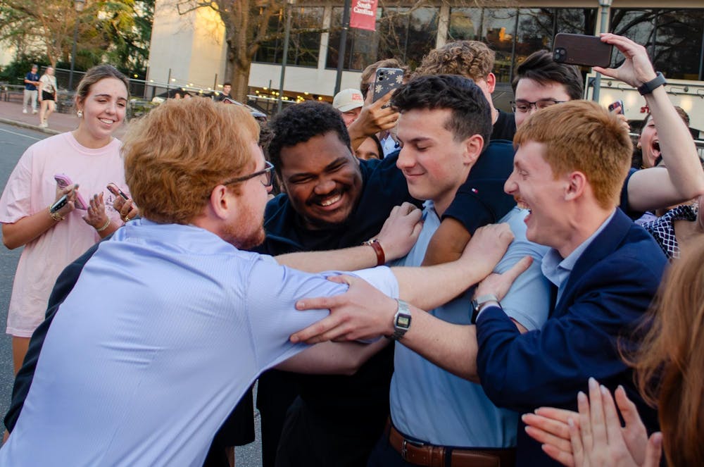 <p>Cole Rotondo and supporters react to him winning the run-off for the student body presidential election on Greene Street on March 4, 2026. Rotondo’s running mate Myron Harris, on the left, was elected student body vice president last week.</p>