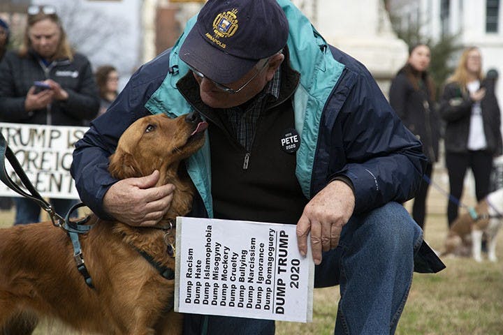 Jim Guilfoyle, Retired
Jim Guilfoyle was holding a sign that advocated for Trump’s removal. The sign had many short sayings starting with the word “Dump,” ultimately leading to “Dump Trump.” After listening to speakers, Mr. Guilfoyle walked around and talked to some of the people managing the booths.