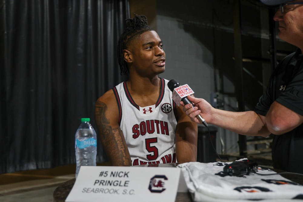 <p>FILE – Graduate forward Nick Pringle talks to a reporter after a team practice on Oct. 21, 2024, at Colonial Life Arena. Pringle spent the last two years at Alabama before transferring to South Carolina for the 2024 season.</p>