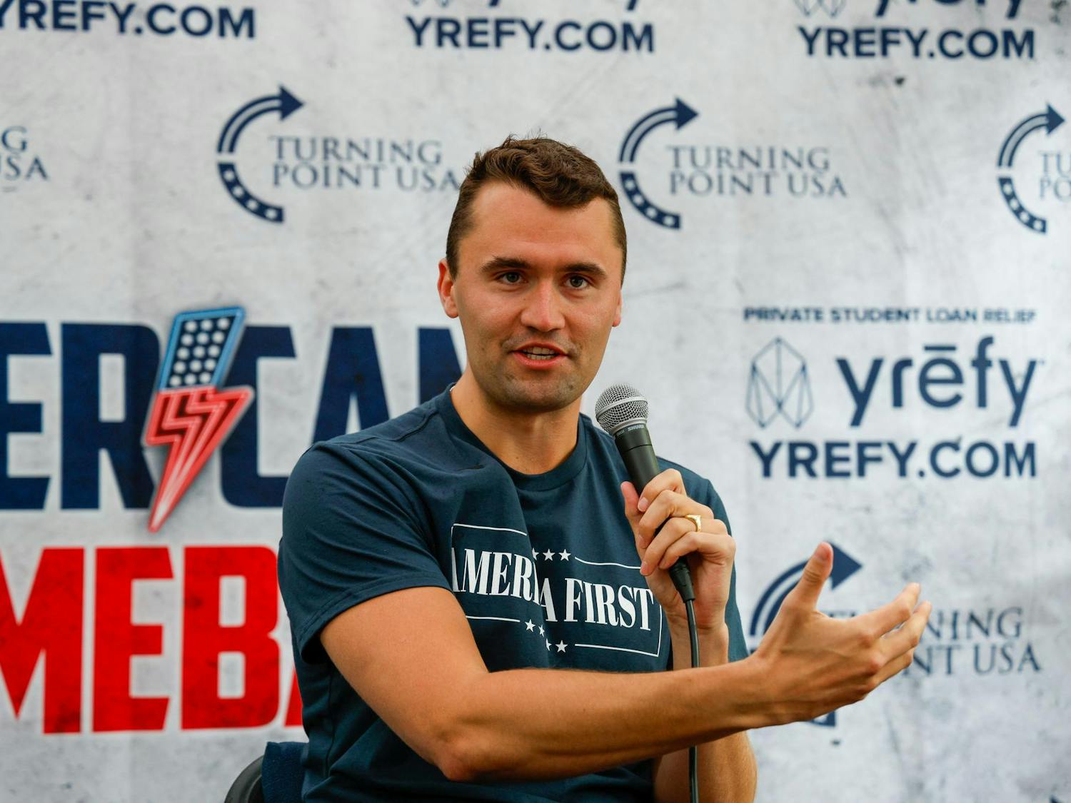 FILE — Conservative activist and Turning Point USA Founder Charlie Kirk speaks at an open debate forum on Greene Street on Apr. 7, 2025. On Sept. 10, 2025, Kirk was shot and killed during a similar event on the campus of Utah Valley University.