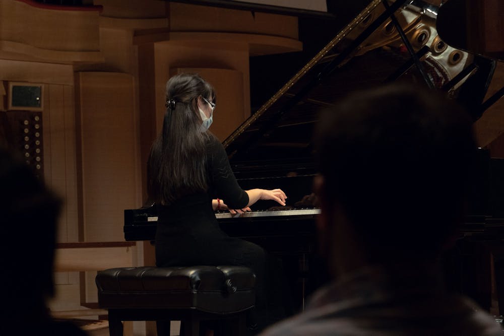<p>USC School of Music student performs a piano art song during the "Together: A celebration of Asian and Pacific Islander Communities" concert on March 15, 2022. &nbsp;The concert focused on the celebrating and showcasing works from Asian and Pacific Islander composers in recognition of the lives lost on March 16, 2021.</p>