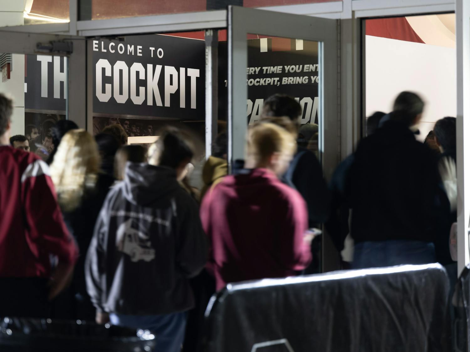 Gamecock students enter through the security scanners before the ticketing checkpoint at the student entrance of Colonial Life Arena on Nov. 28, 2023. Attendance to various school athletic events gives students the opportunity to obtain a higher chance to get tickets through the Cockpit app in the future.