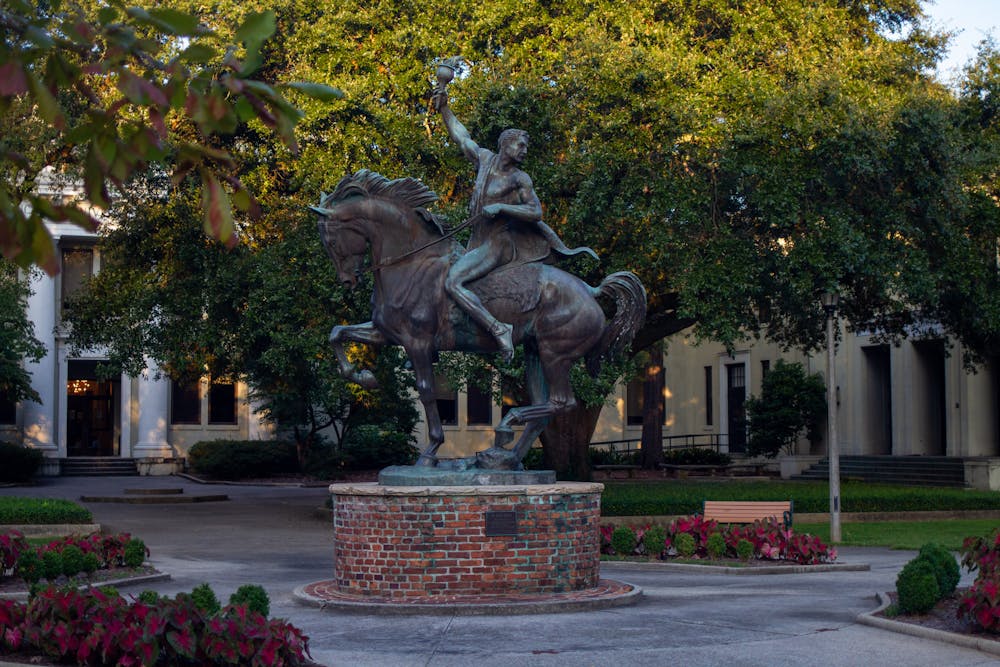 <p>“The Torch Bearer” by Anna Hyatt Huntington stands in front of Wardlaw College on Sept. 12, 2022. Wardlaw College serves as the home of USC's College of Education.</p>