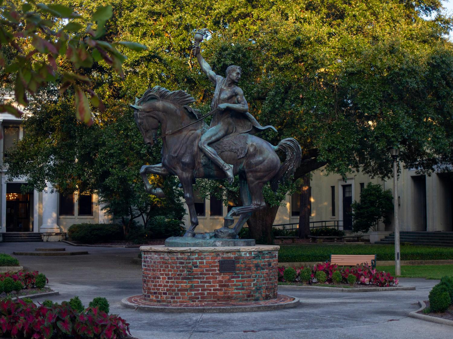 “The Torch Bearer” by Anna Hyatt Huntington stands in front of Wardlaw College on Sept. 12, 2022. Wardlaw College serves as the home of USC's College of Education.