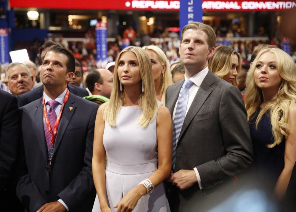 From left, Donald Trump Jr., Ivanka Trump, Eric Trump and Tiffany Trump, take part in the roll call vote putting their father, Republican presidential candidate Donald Trump, over the top on the second day of the Republican National Convention on Tuesday, July 19, 2016, at Quicken Loans Arena in Cleveland. (Brian van der Brug/Los Angeles Times/TNS) 