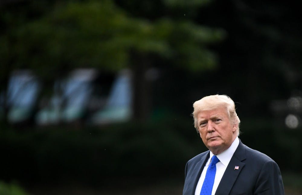 President Donald Trump walks on the South Lawn before departing the White House in Washington, D.C., on Thursday, Sept. 20, 2018. (Olivier Douliery/Abaca Press/TNS)