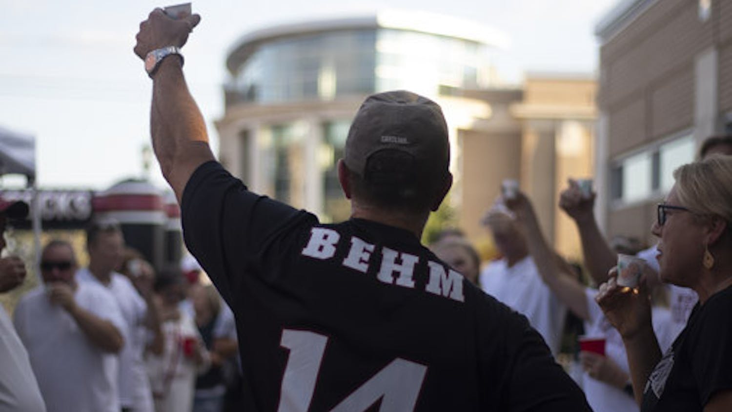Gary Behm raises his glass for a toast before the Gamecock women's soccer team takes on Tennessee on Sept. 24, 2023. Behm is the father of senior midfielder Brianna Behm.