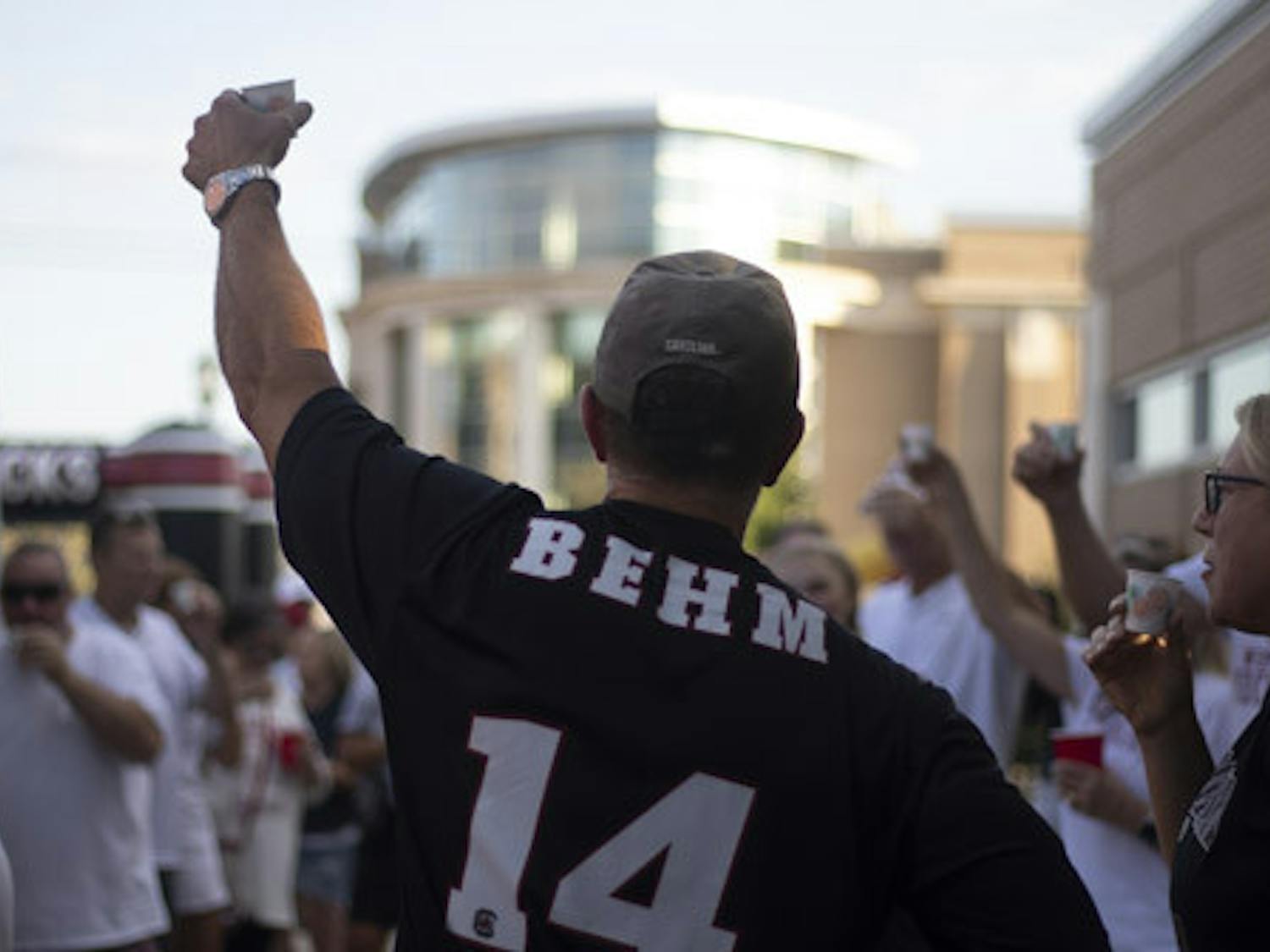 Gary Behm raises his glass for a toast before the Gamecock women's soccer team takes on Tennessee on Sept. 24, 2023. Behm is the father of senior midfielder Brianna Behm.