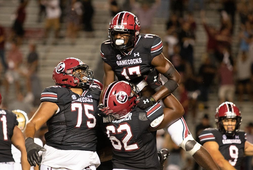 <p>Gamecock football players celebrate junior wide receiver Xavier Legette after he caught the winning touchdown pass. The Gamecocks defeated the Vanderbilt Commodores with a touchdown in the fourth quarter.&nbsp;</p>
