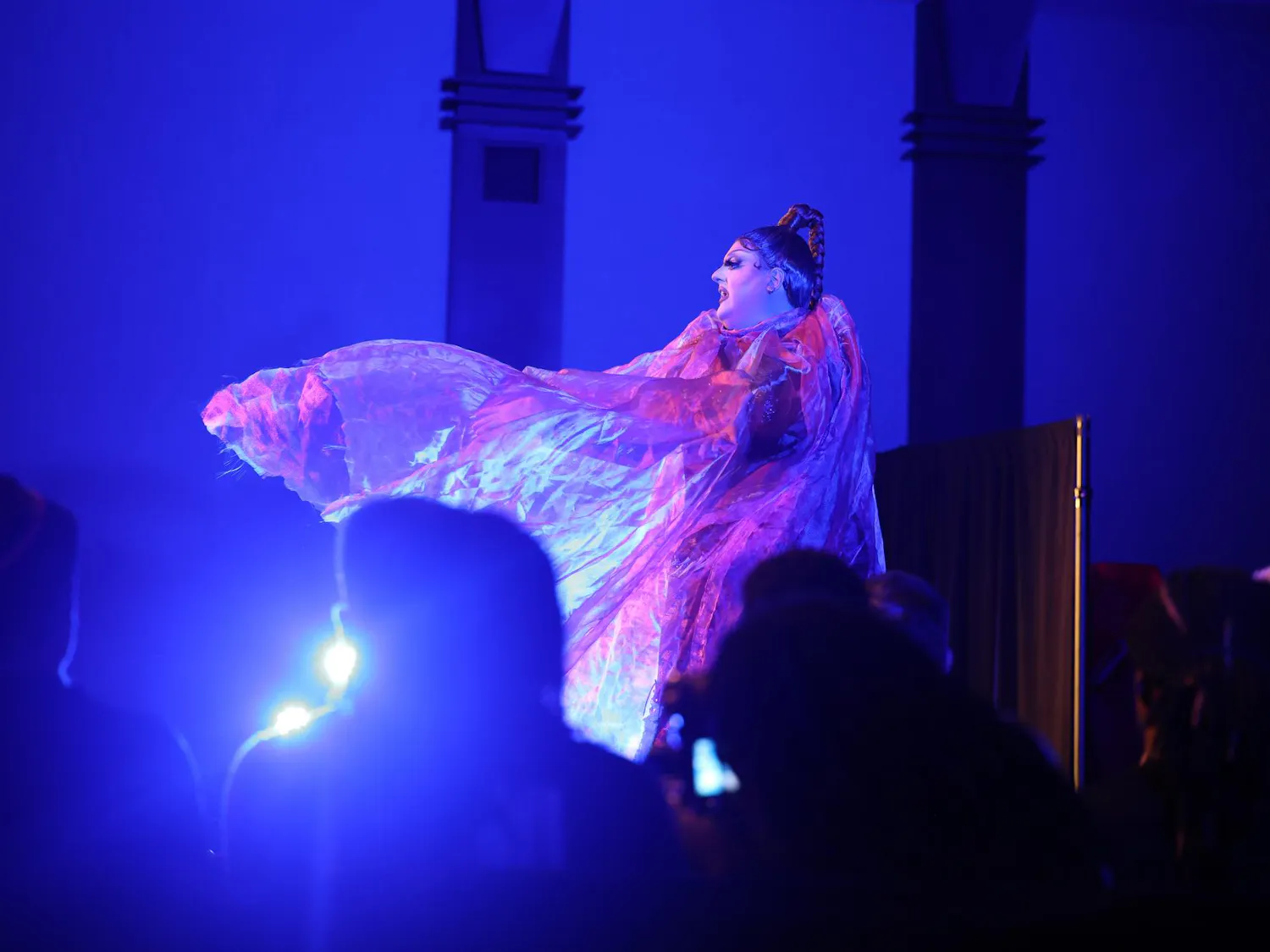 Drag queen Gouda Judy performs and lip-syncs on stage April 14, 2026, in the Russell House Ballroom. All the drag performers who attended the event were from South Carolina.
