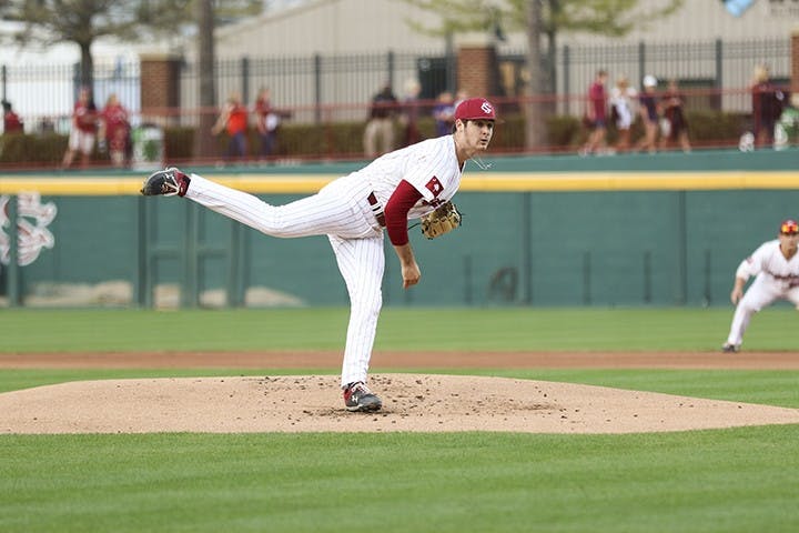 Freshman Daniel Lloyd pitches the ball during the Friday night game against Auburn at Founders Park.