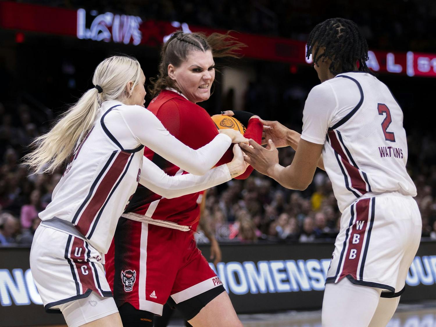 Sophomore forward Chloe Kitts and sophomore forward Ashlyn Watkins fight for the ball during the NCAA semifinal matchup of South Carolina and NC State. The Gamecocks limited the Wolf Pack to only 6 points in the third quarter.
