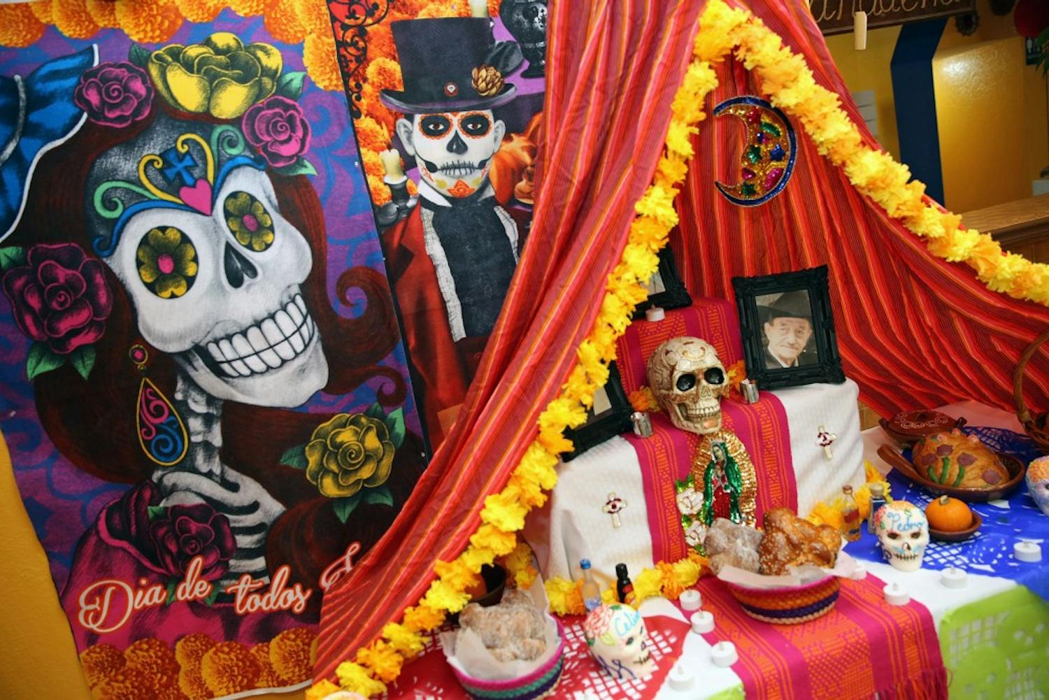 A Shrine of 'Dia de Muertos' at Mi Riconcito Mexican Bakery on Calle Ocho in Little Havana on Nov. 1, 2016. The Day of the Dead is a longstanding Mexican holiday that combines traditional native beliefs with traditional Spanish Catholic beliefs. The Day of the Dead celebrate dead family members through a series of events that take place on Nov. 1st and 2nd in Mexico and many cultures around the world. (C.M Guerrero/Miami Herald/TNS) 