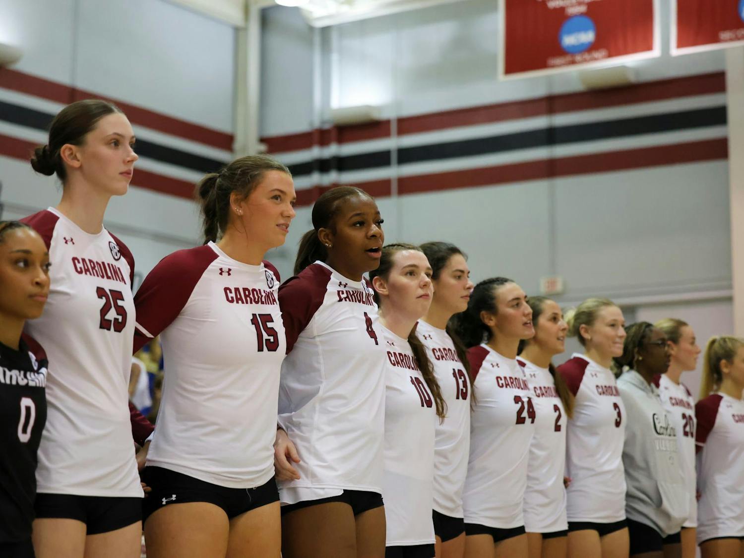 University of South Carolina volleyball players line up after their home opener against Temple on Sept. 6, 2024. The Gamecocks defeated the Owls 3-0 in front of a packed arena.