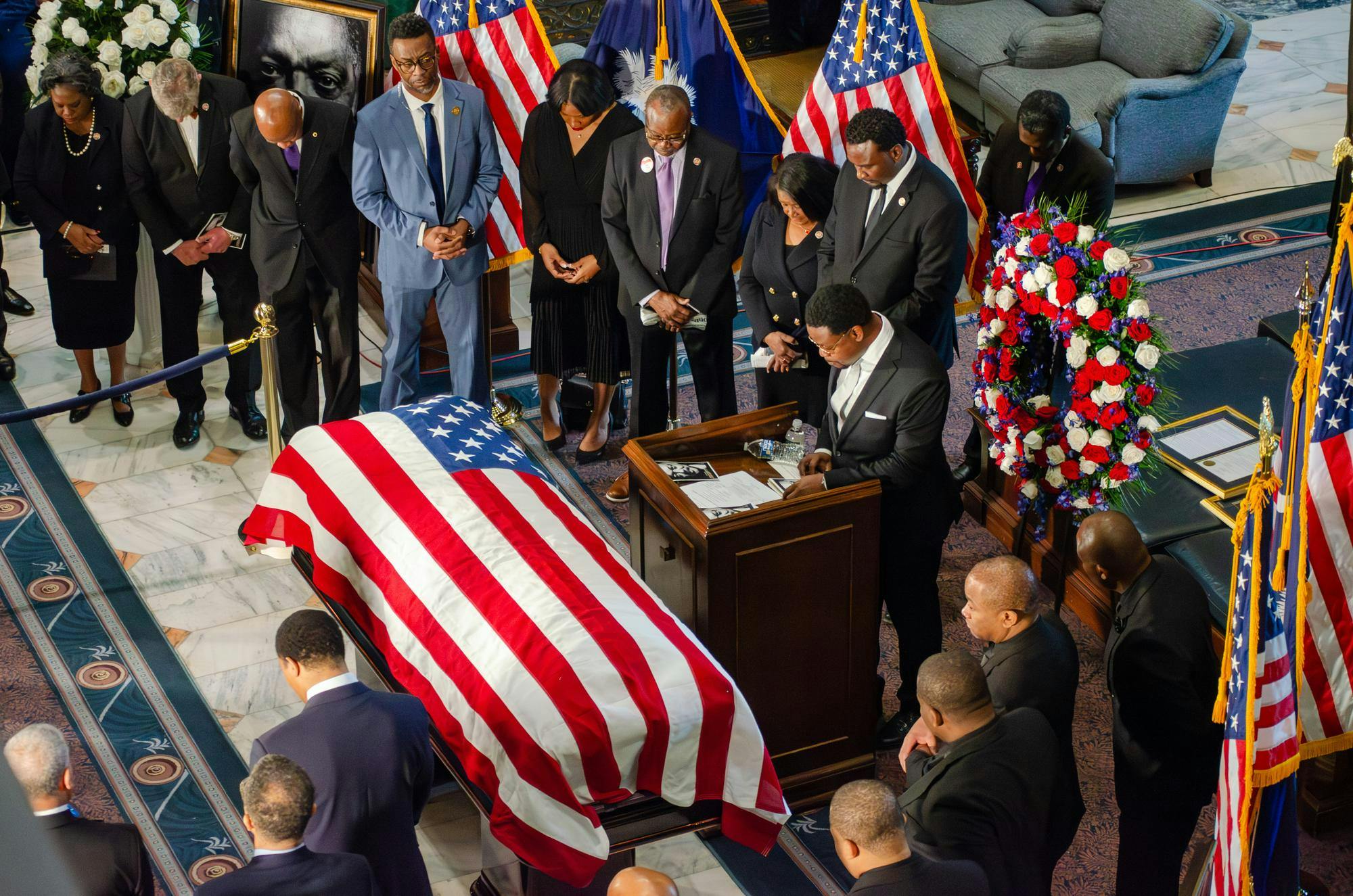 Mourners bow their heads in prayer at the lying-in-state of the Rev. Jesse Jackson in the South Carolina State House on March 2, 2026. Jackson, a Greenville, South Carolina, native and two-time presidential candidate, passed away in Chicago, Illinois, where his funeral will be held.