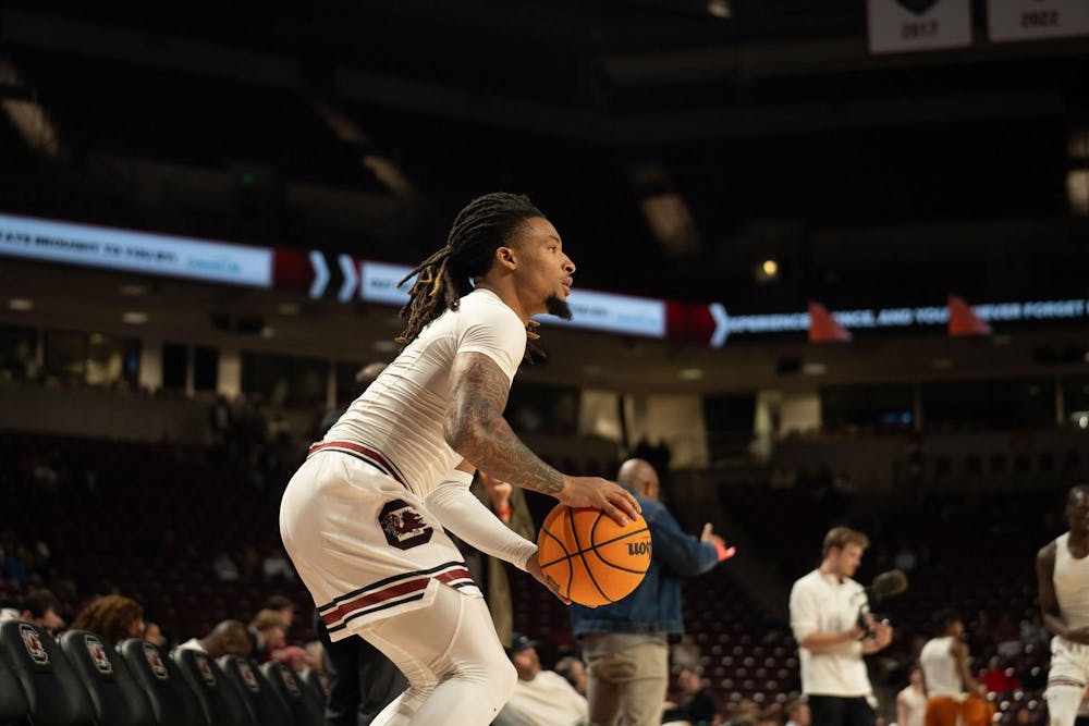 <p>Senior guard Jamarii Thomas practices his shots during warms up before matchup against the Texas Longhorns at the Colonial Life Arena.</p>