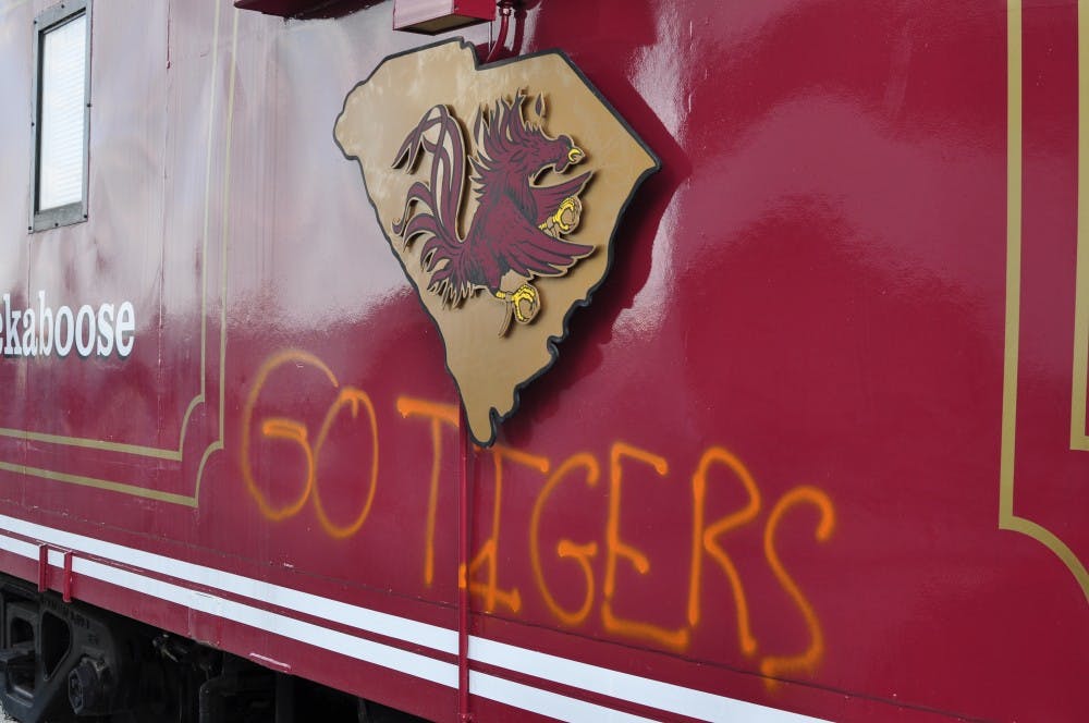 	The phrase &#8220;Go Tigers&#8221; was spray painted on the side of a Cockaboose at Williams Brice Stadium on Tuesday. At least one other Cockaboose was spray painted as well as Williams Brice Field.