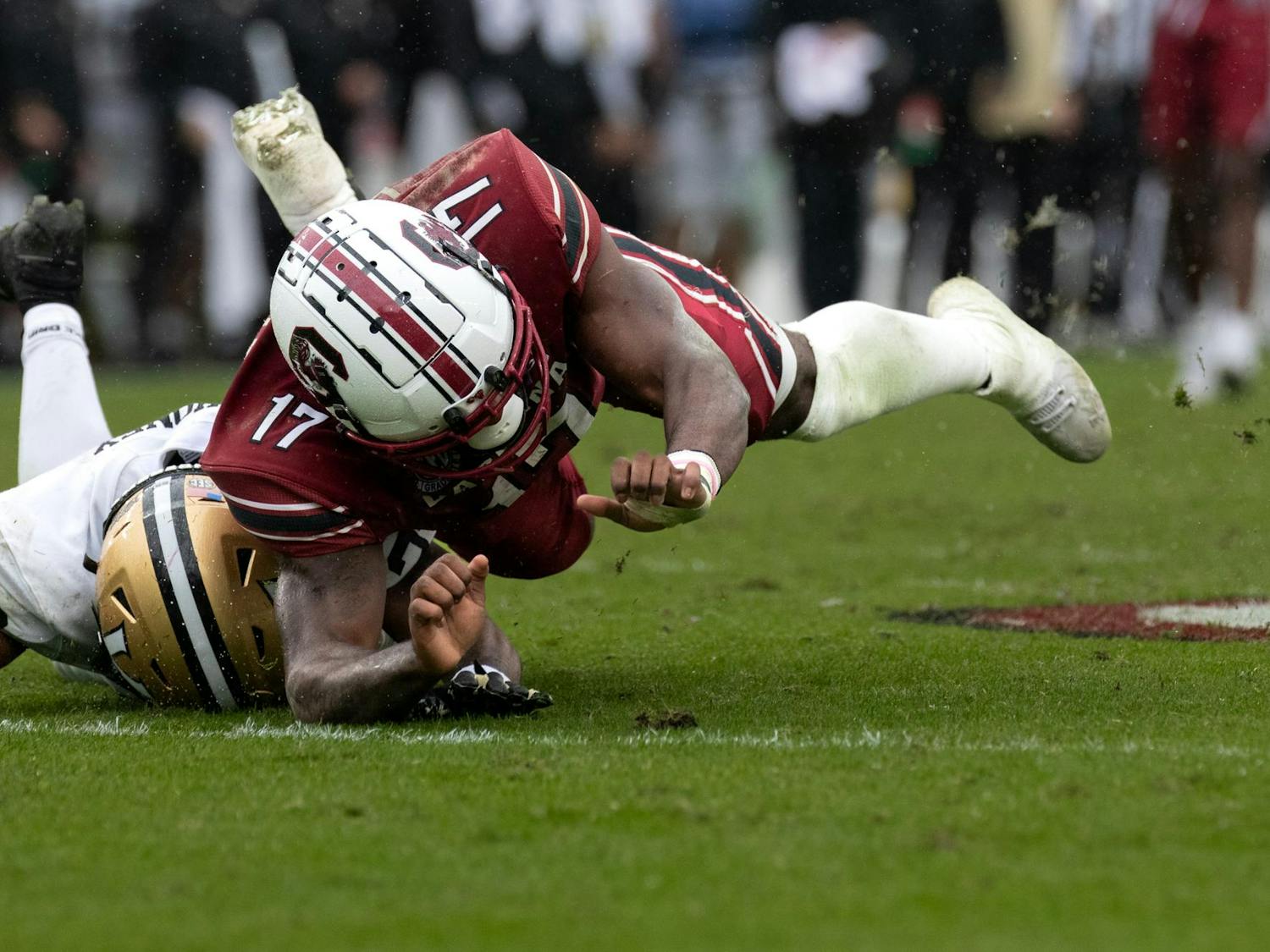 Fifth-year wide receiver Xavier Legette falls to the ground during a play against Vanderbilt on Nov. 11, 2023. Legette made nine receptions for 120 yards for the Gamecocks during its 47-6 victory over the Commodores.